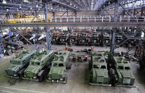 Military vehicle assembly line in a factory