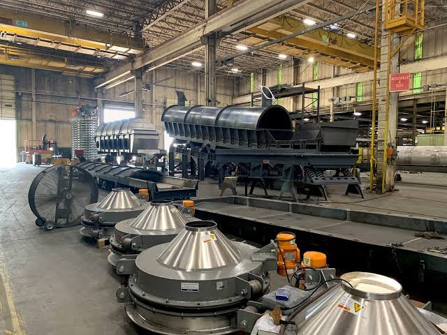 Industrial stainless steel equipment at a manufacturing plant