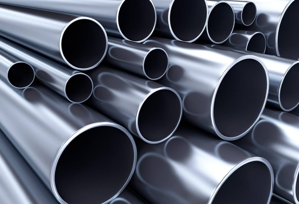 Close-up of polished gunmetal pipes with varying diameters.